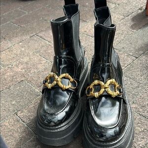 Black Patent Leather Boots with Gold Chain Detail